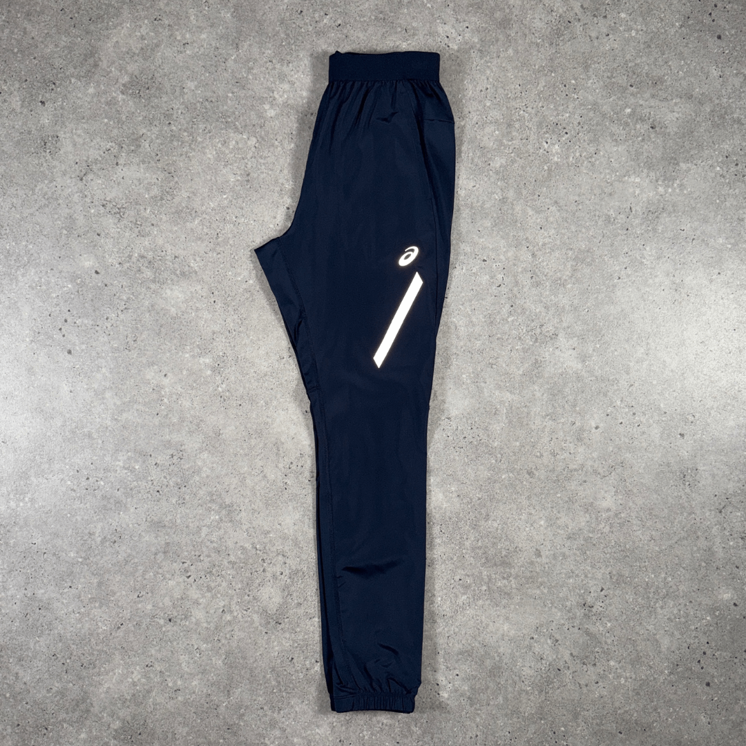 Men's Asics Lite track pant midnight navy blue flat-lay