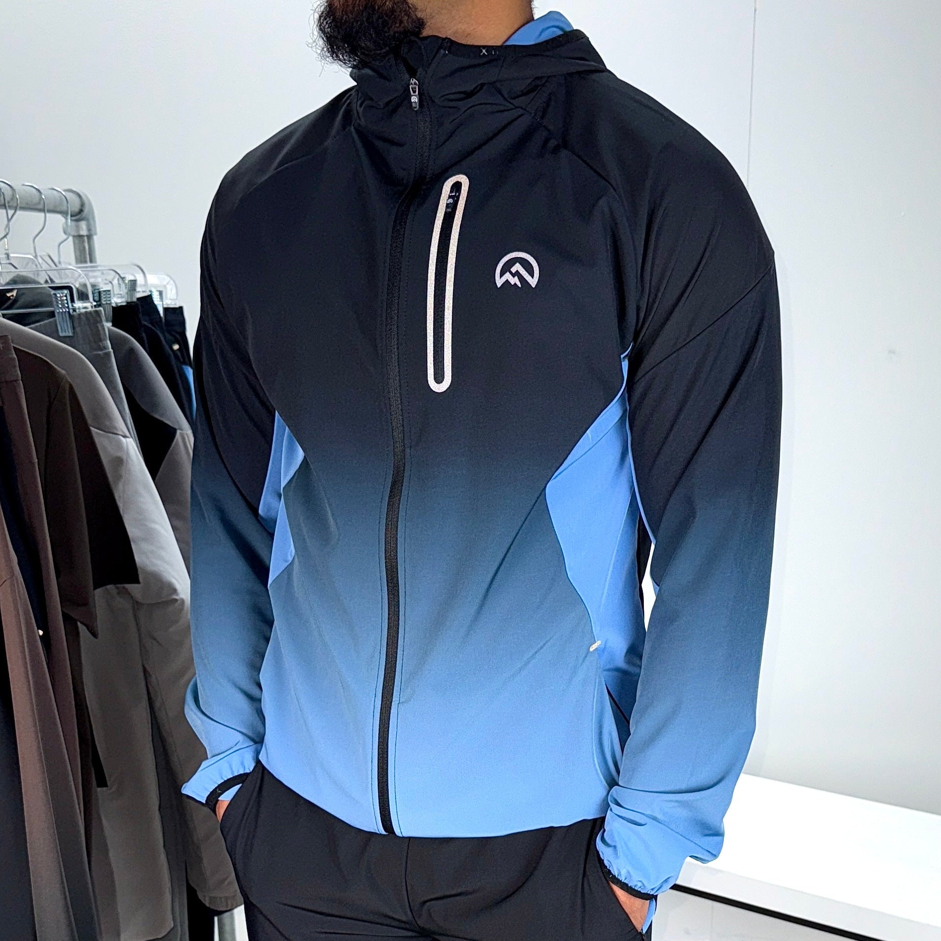 Men's Flux gradient jacket in black and airforce
