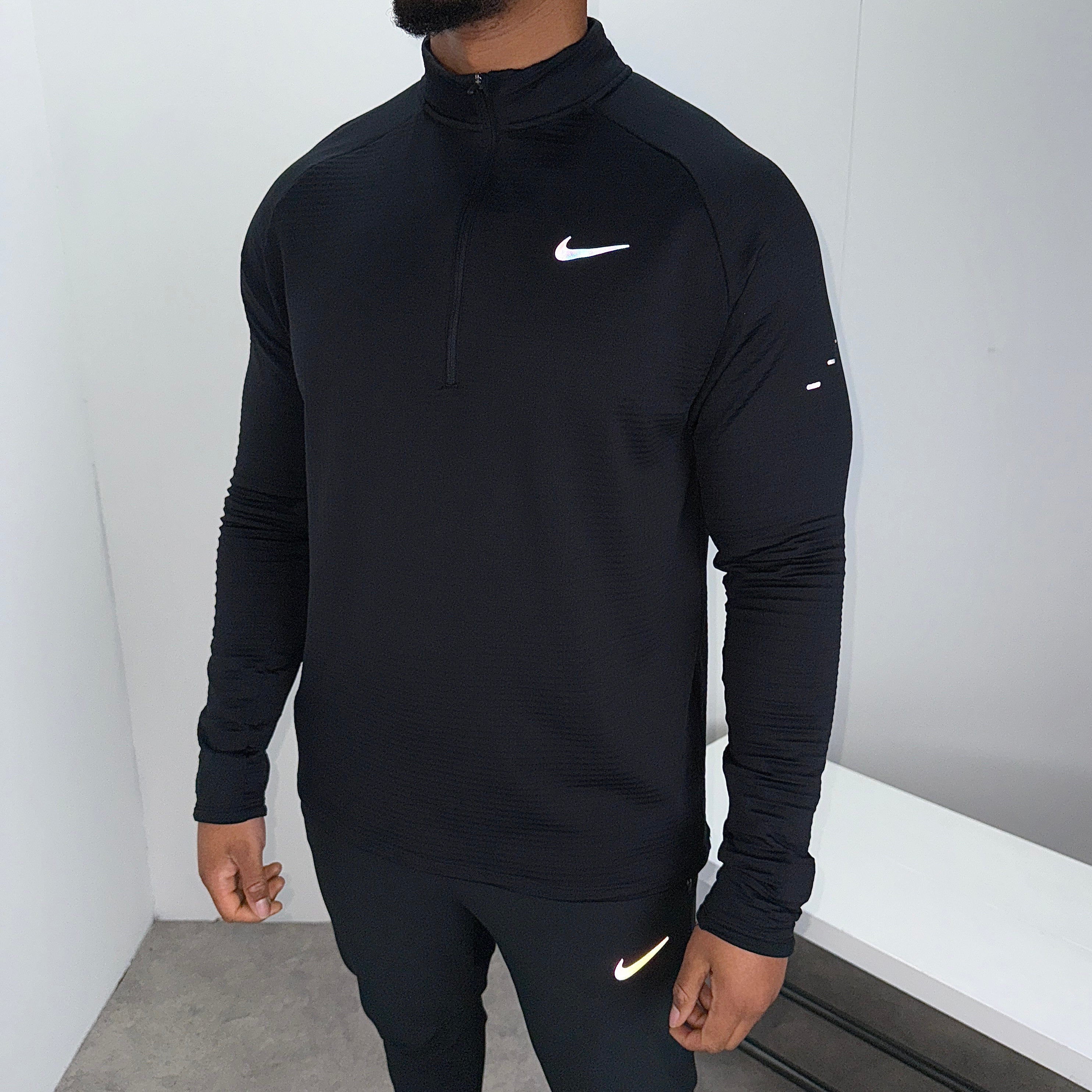 Men's Nike stride therma 1/4 zip in black