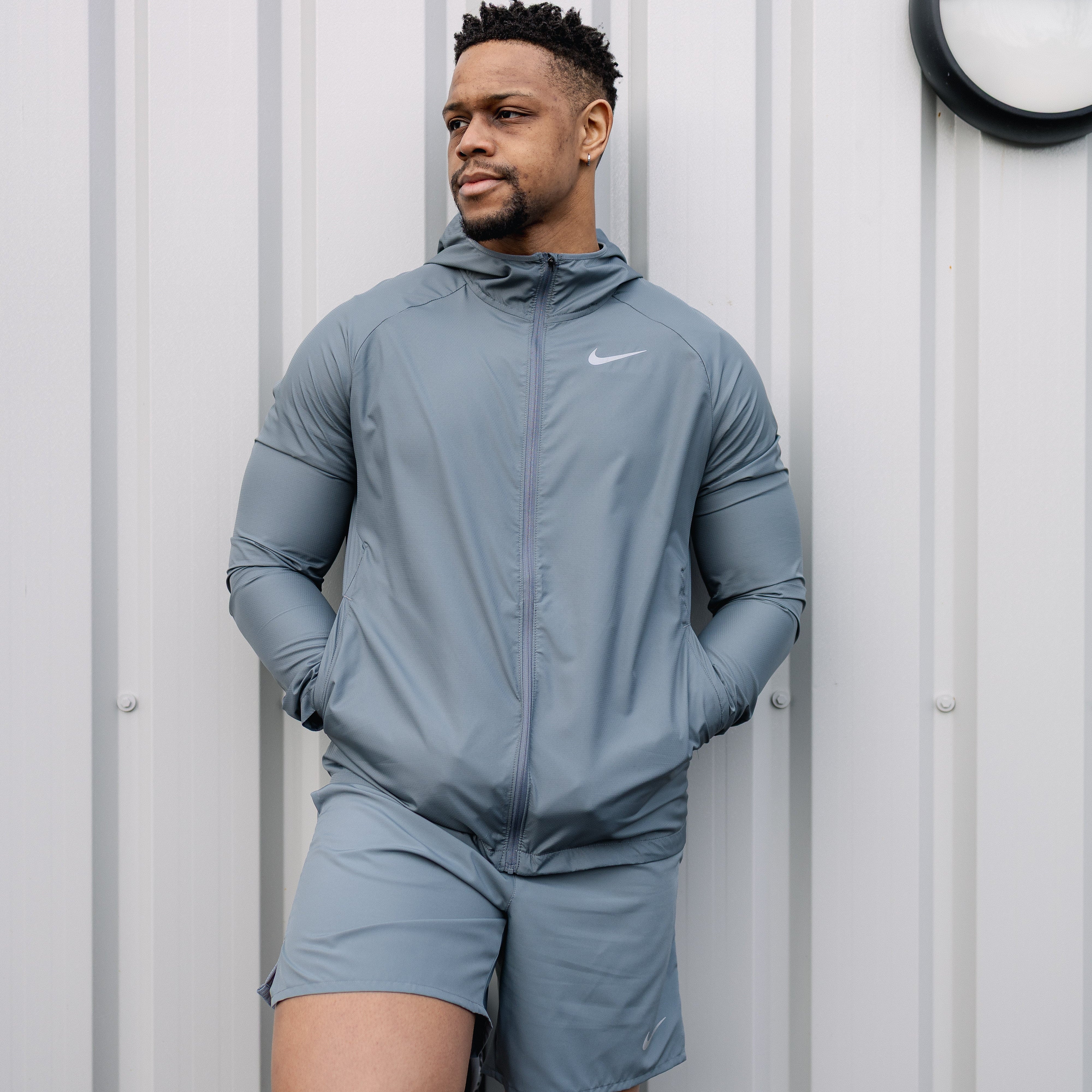 Men's Nike essential jacket shorts set in grey