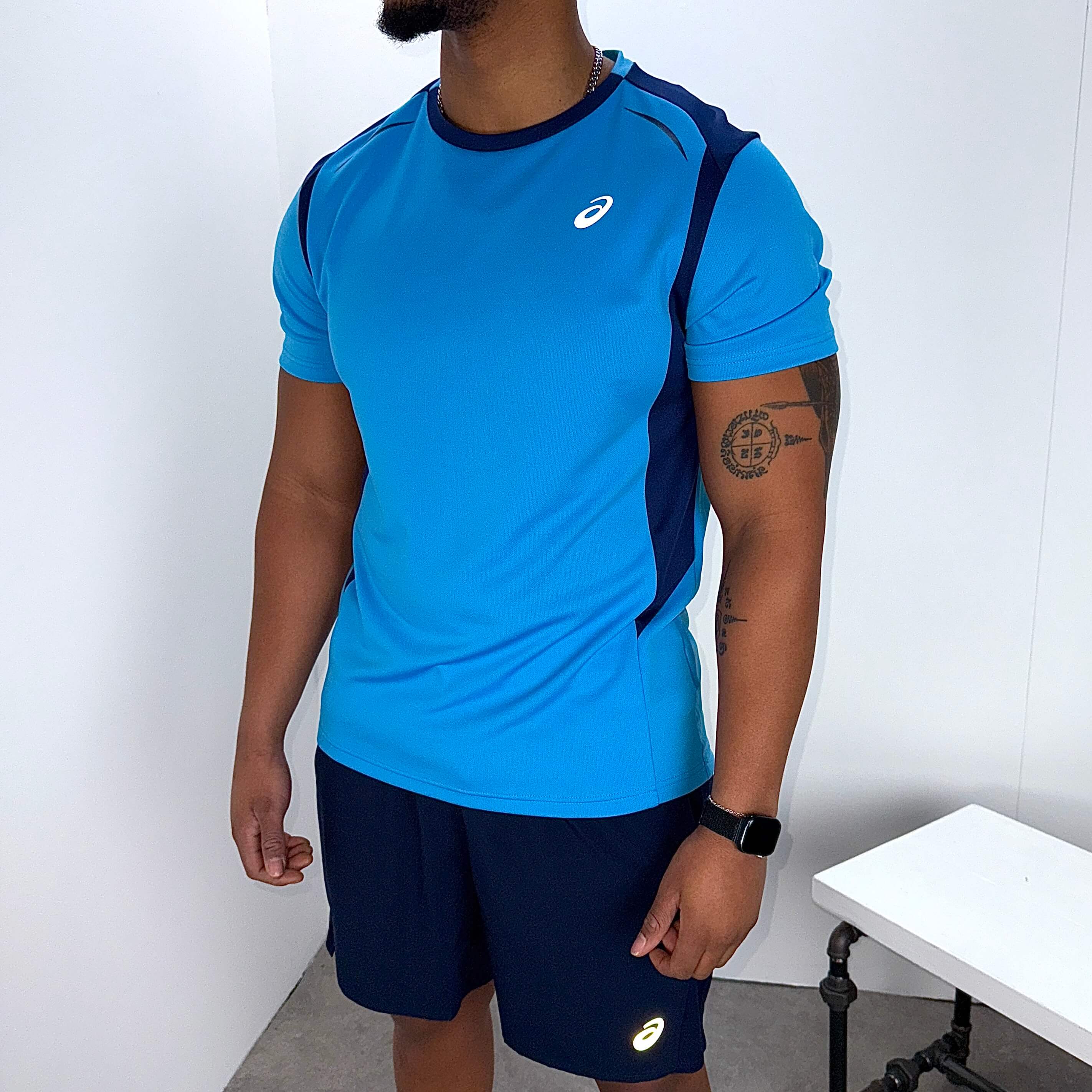 Asics curved seam run set 'blue/midnight'