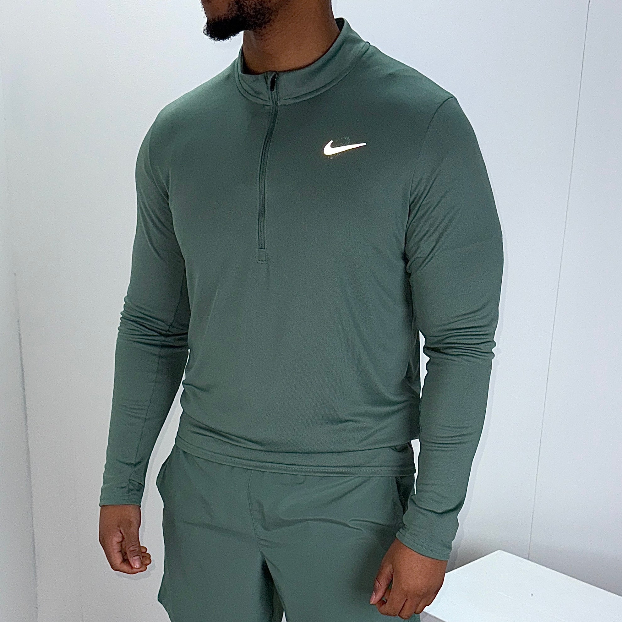 Nike 1/4 zip pacer running top 'clay green'