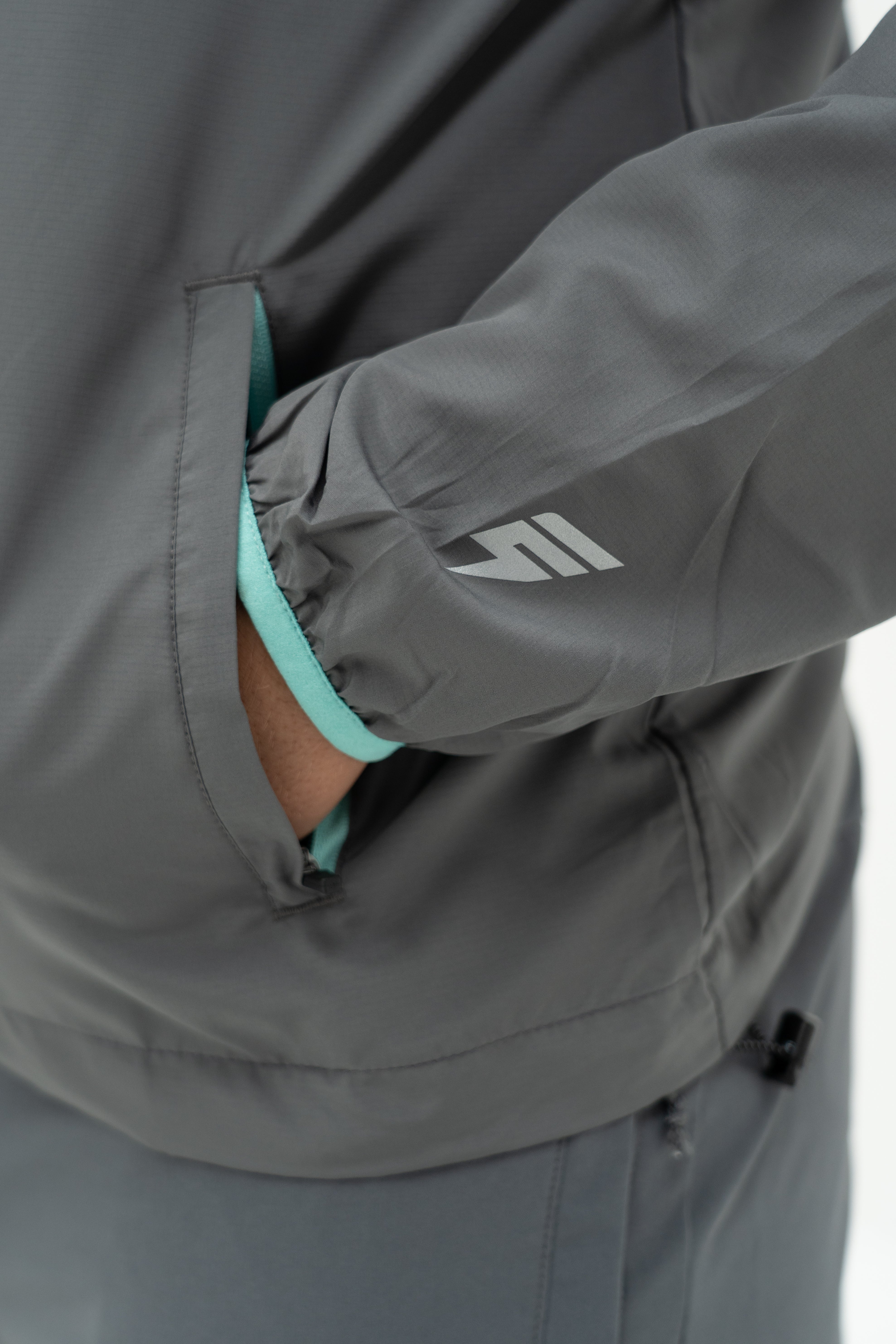 Elude vent windrunner 'grey/mint'