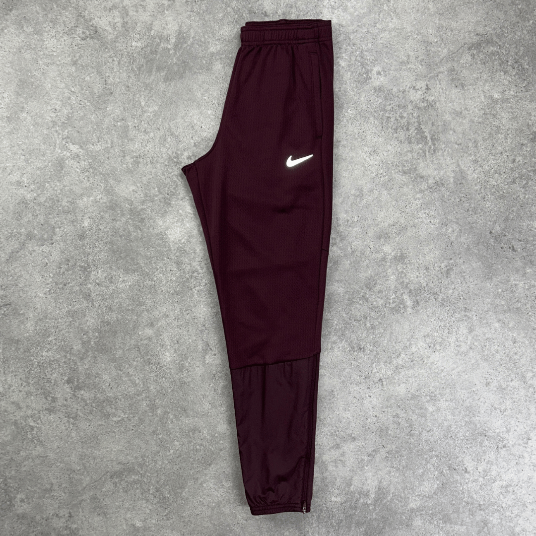 Men's Nike sphere challenger therma-fit pants in burgundy crush