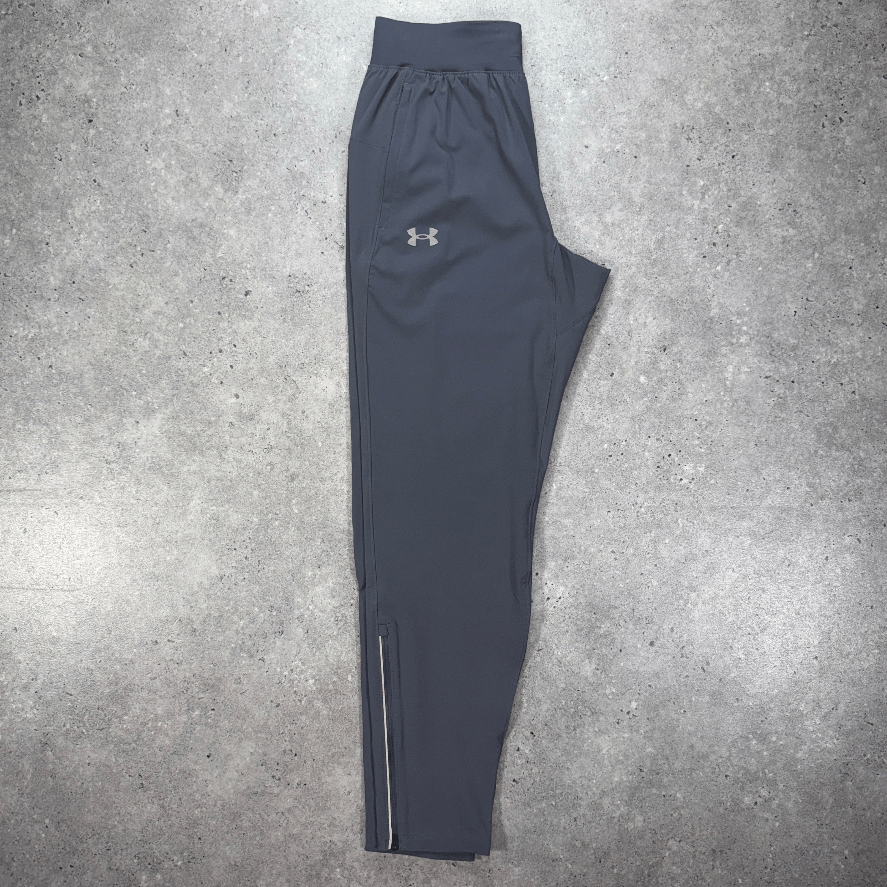 Men's Under armour storm track pants in grey